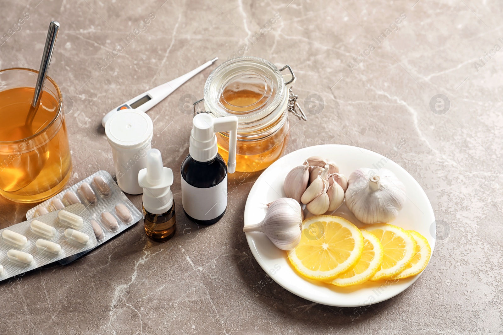 Photo of Natural and medical cold remedies on table