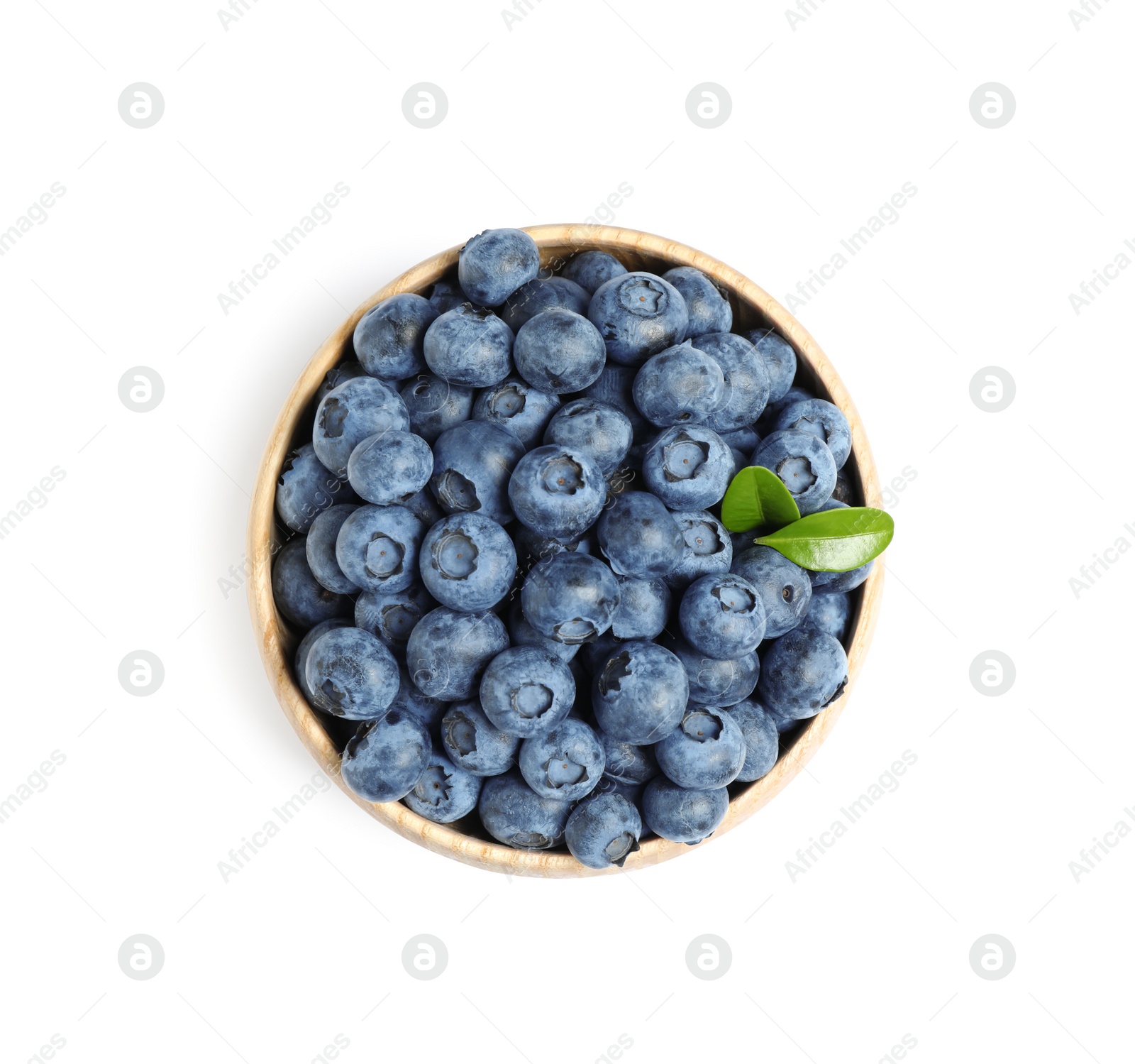 Photo of Fresh ripe blueberries in wooden bowl on white background, top view