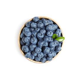 Photo of Fresh ripe blueberries in wooden bowl on white background, top view