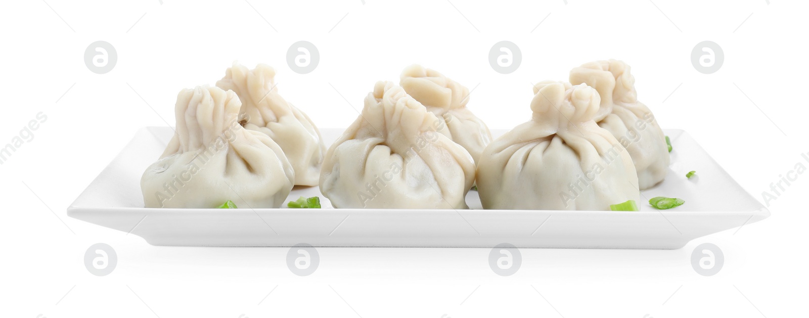 Photo of Plate with tasty fresh khinkali (dumplings) isolated on white. Georgian cuisine