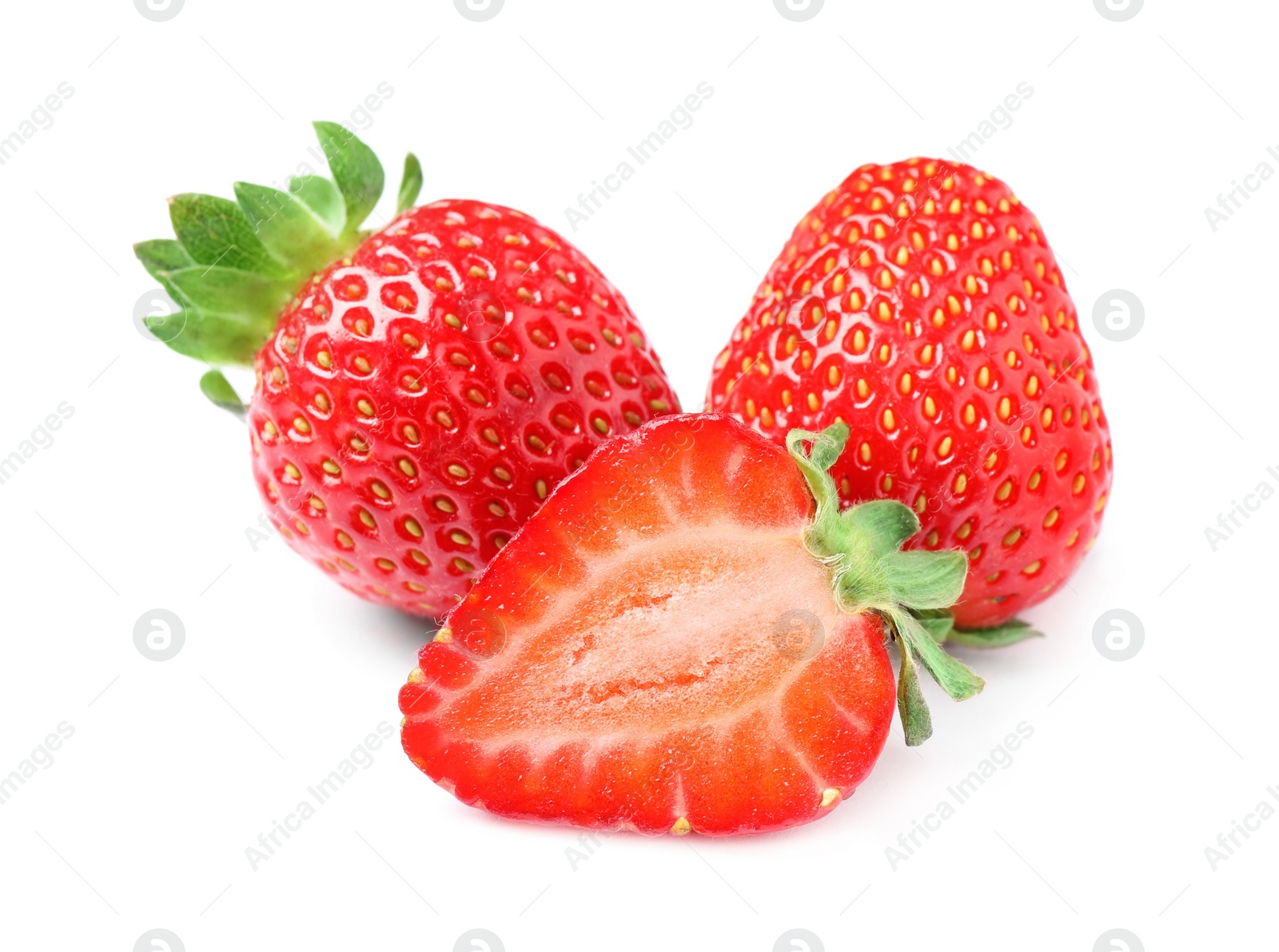 Photo of Delicious cut and whole strawberries on white background