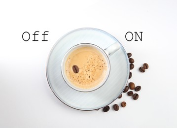 Coffee break. Cup of aromatic hot drink and beans on white background, top view