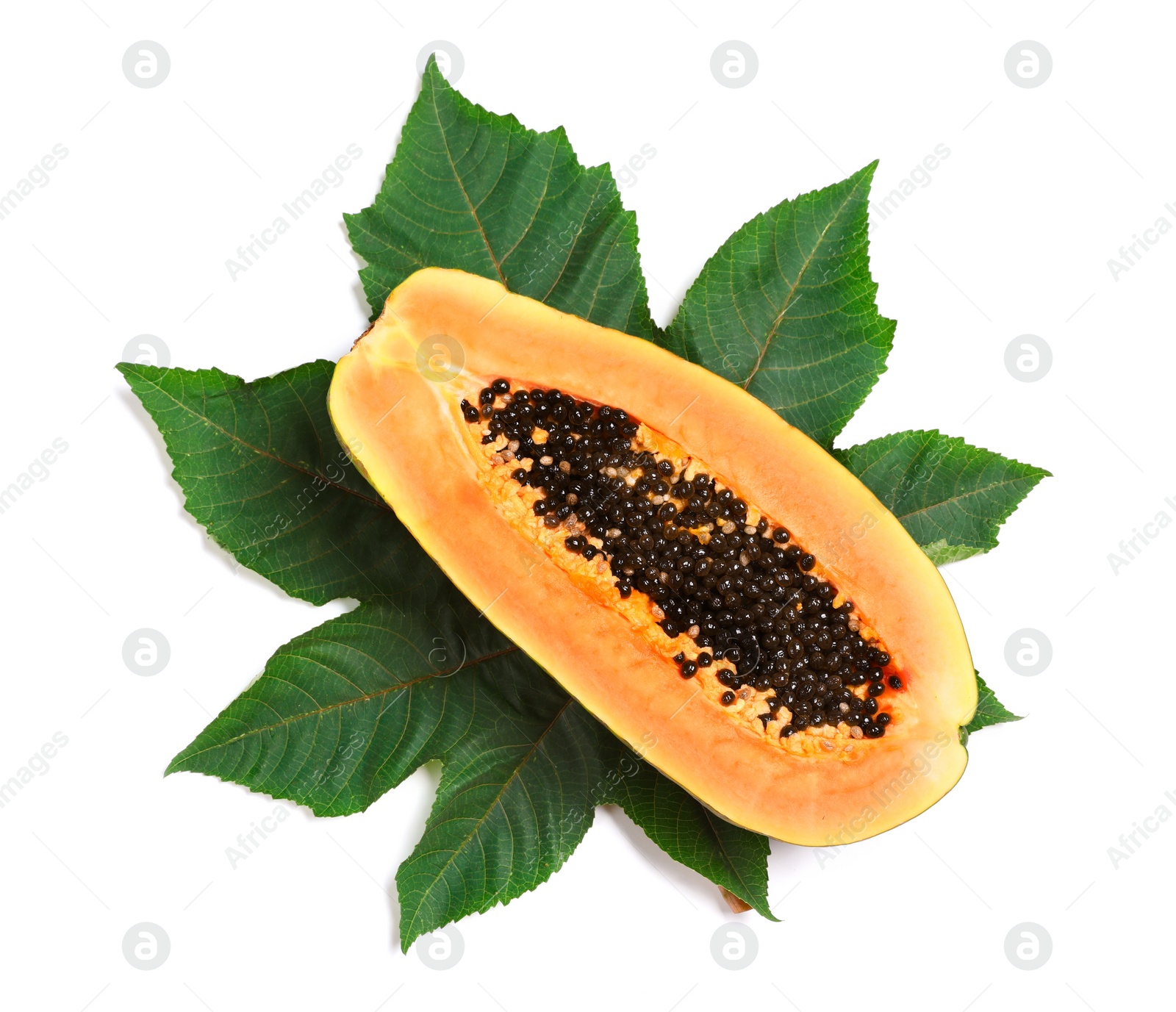 Photo of Fresh juicy halved papaya with leaf on white background, top view