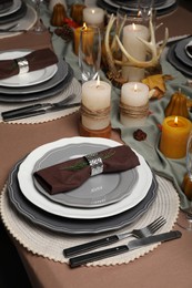 Photo of Beautiful autumn place setting and decor for festive dinner on table