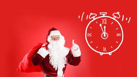 Image of Christmas countdown. Clock showing five minutes to midnight near Santa Claus on red background