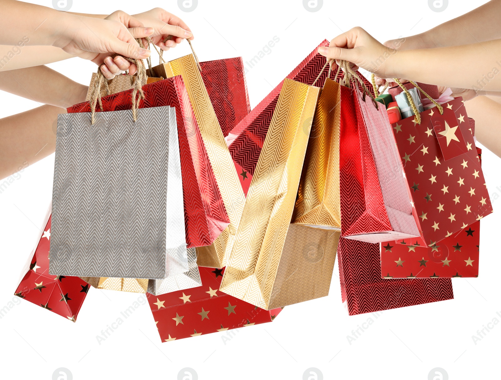 Image of Women holding paper shopping bags on white background, closeup