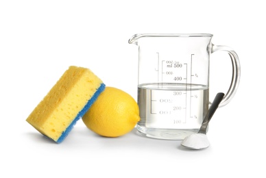 Photo of Composition with vinegar, lemon and baking soda on white background. House cleaning