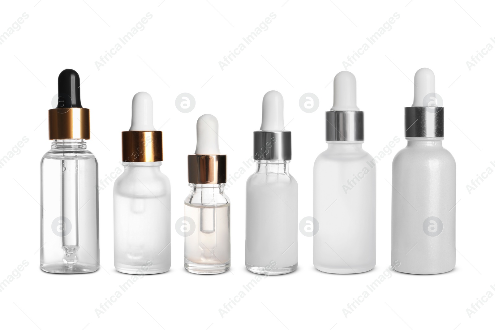 Image of Serums in different bottles isolated on white, collection