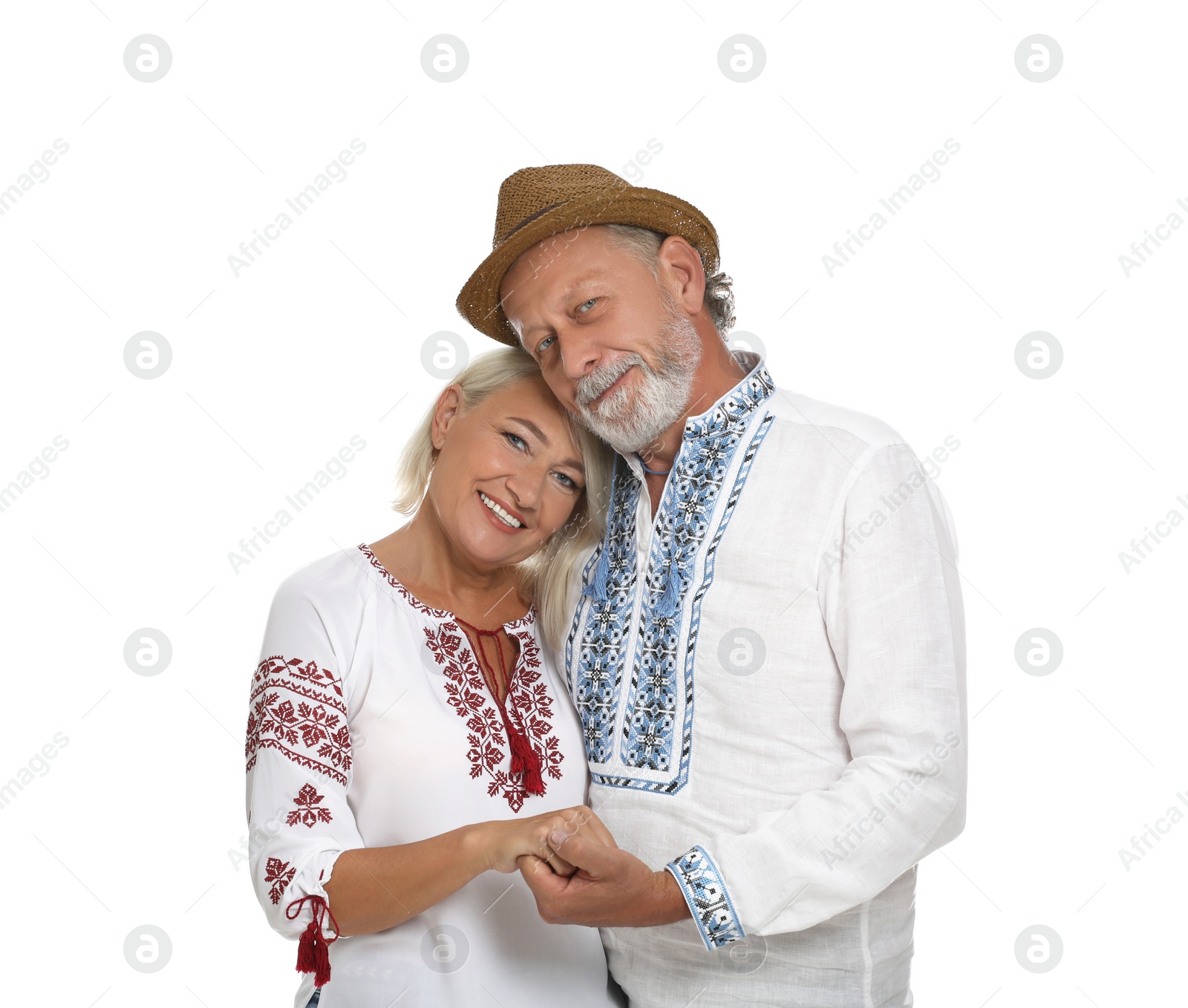 Photo of Happy mature couple in Ukrainian national clothes on white background