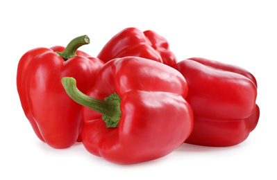 Photo of Ripe red bell peppers isolated on white