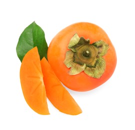 Photo of Whole and cut delicious ripe juicy persimmons with green leaf on white background, top view