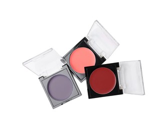 Photo of Cream lipstick palettes refills isolated on white, top view. Professional cosmetic product