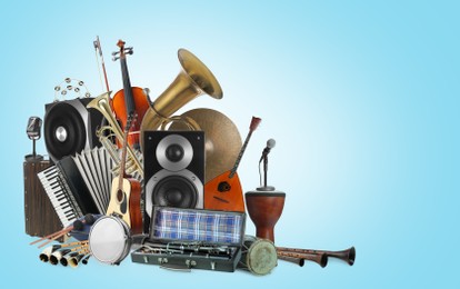 Image of Group of different musical instruments on light blue background