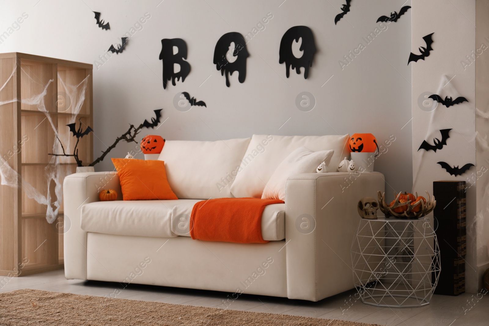 Photo of Stylish room interior with creative Halloween decor