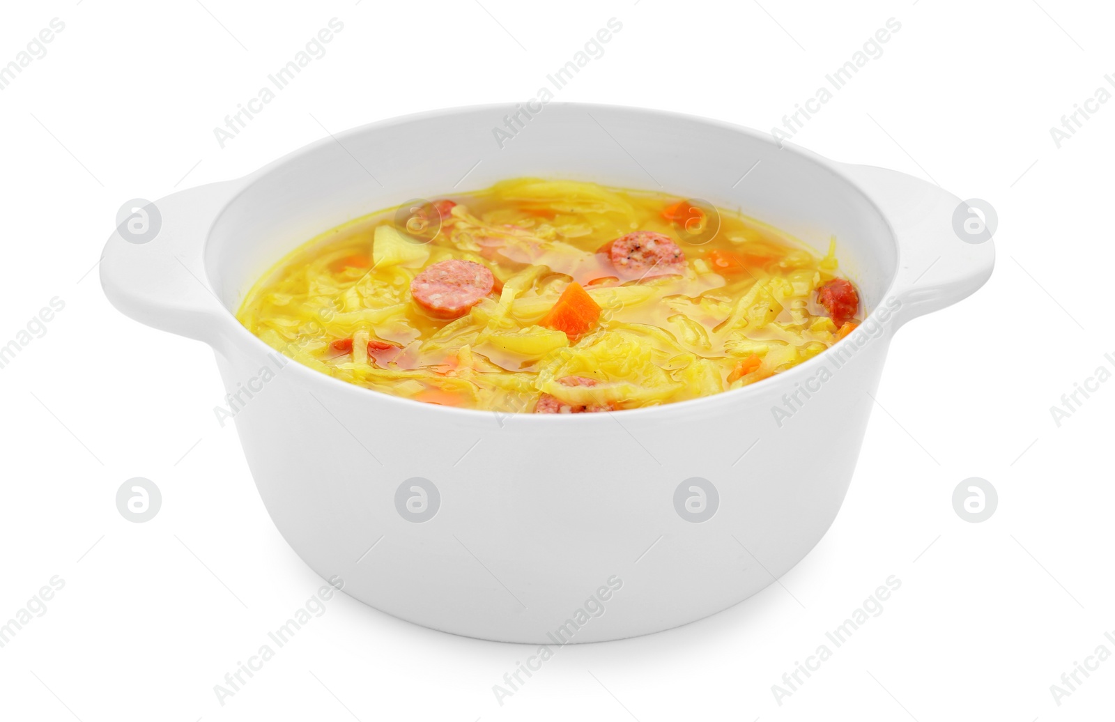 Photo of Bowl of delicious sauerkraut soup with smoked sausages isolated on white