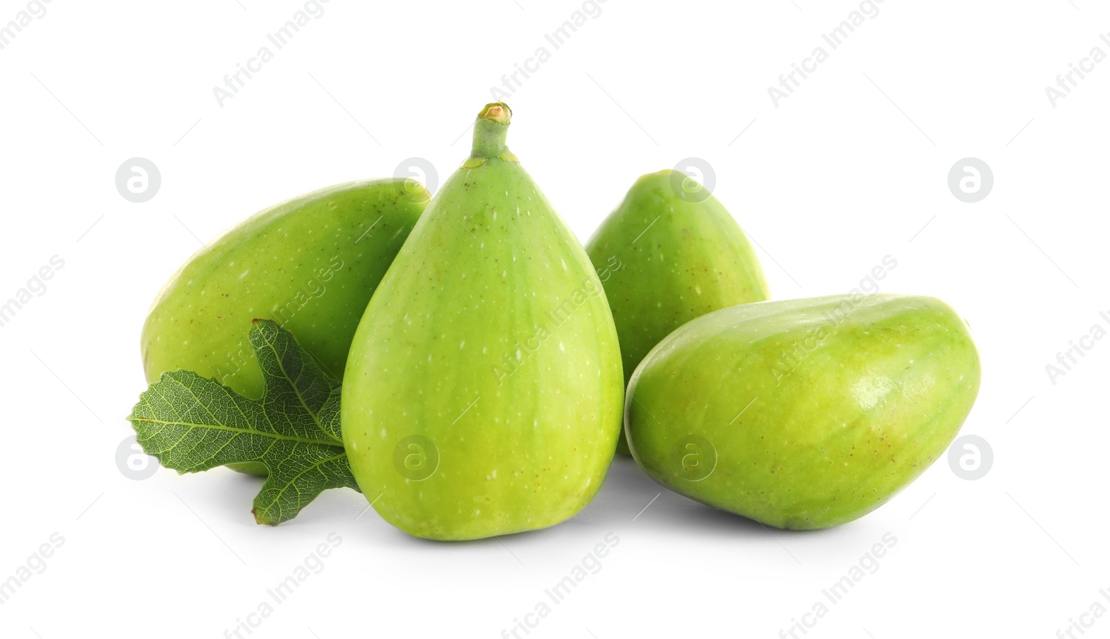 Photo of Fresh green figs isolated on white. Tropical fruit