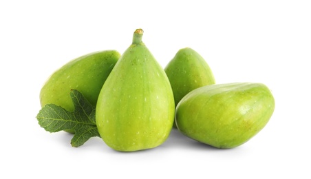 Fresh green figs isolated on white. Tropical fruit