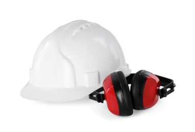Photo of Hard hat and earmuffs isolated on white. Safety equipment