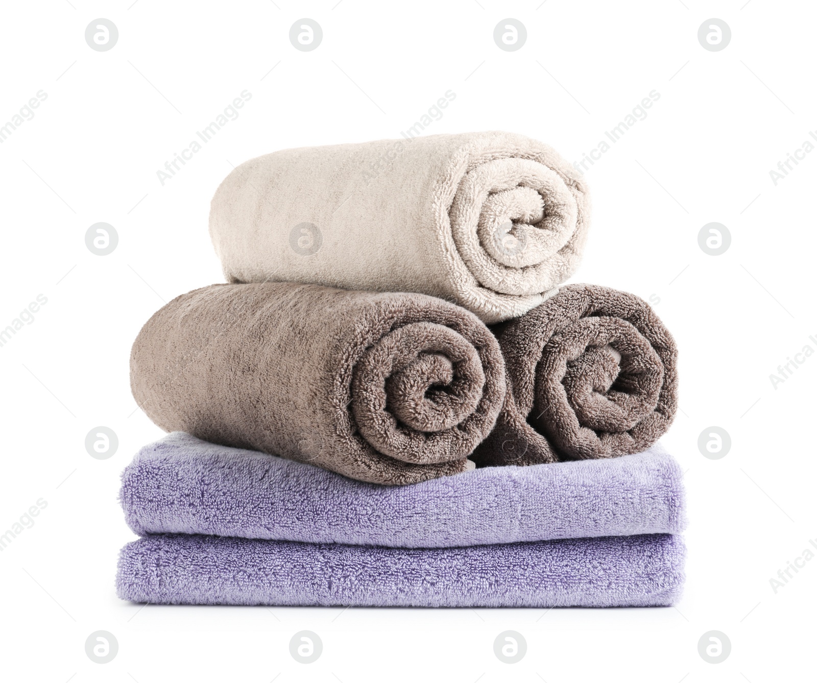 Photo of Stack of fresh towels isolated on white