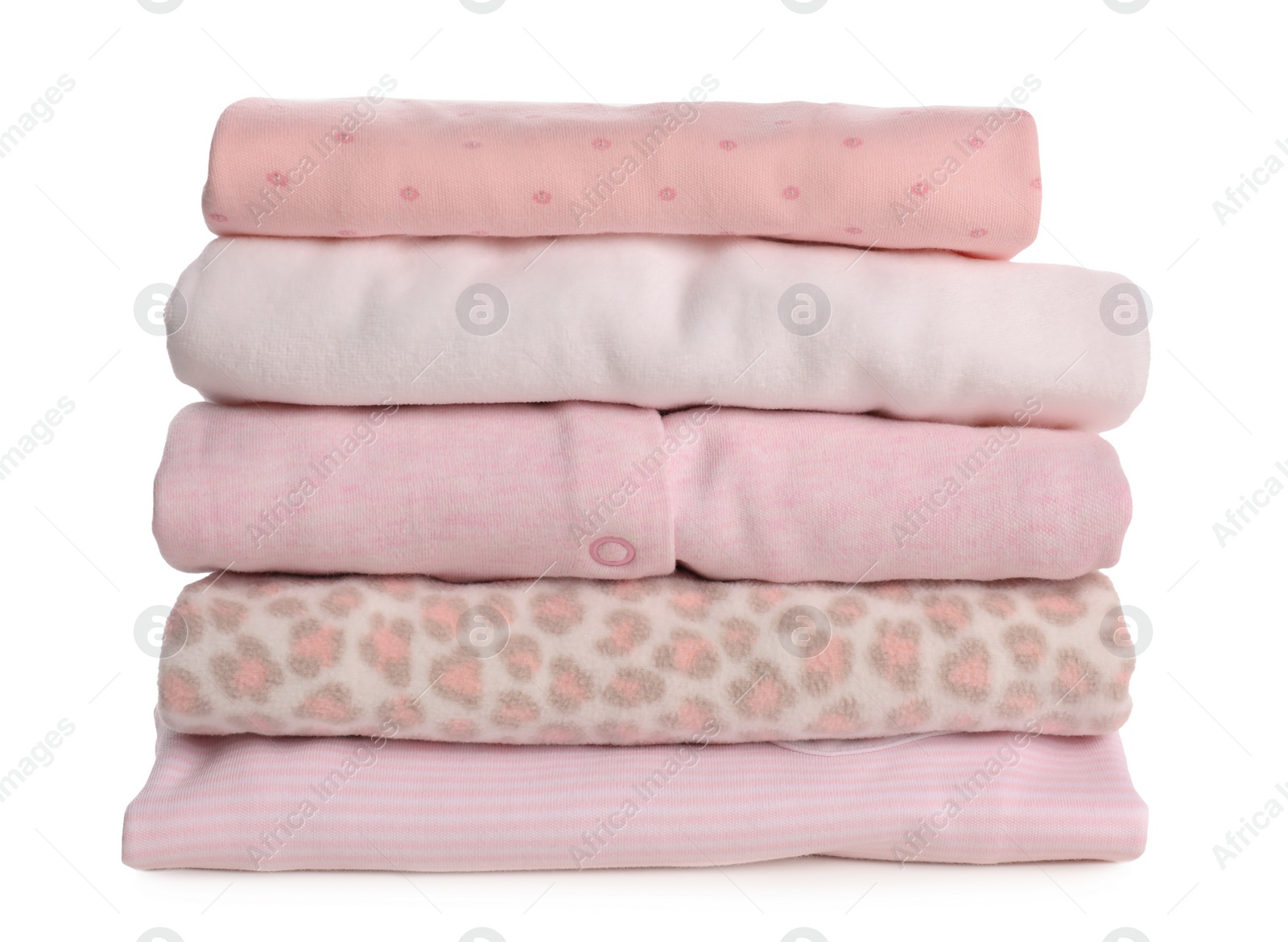 Photo of Stack of baby girl's clothes on white background