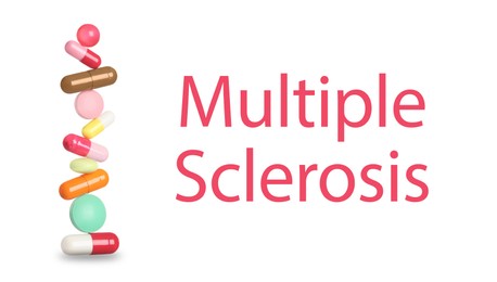 Image of Multiple sclerosis treatment. Stack of different colorful pills on white background