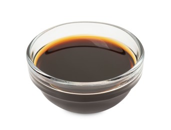 Photo of Tasty soy sauce in glass bowl isolated on white