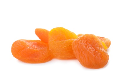 Photo of Tasty apricots on white background. Dried fruit as healthy food