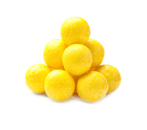 Tasty small lemon drops isolated on white