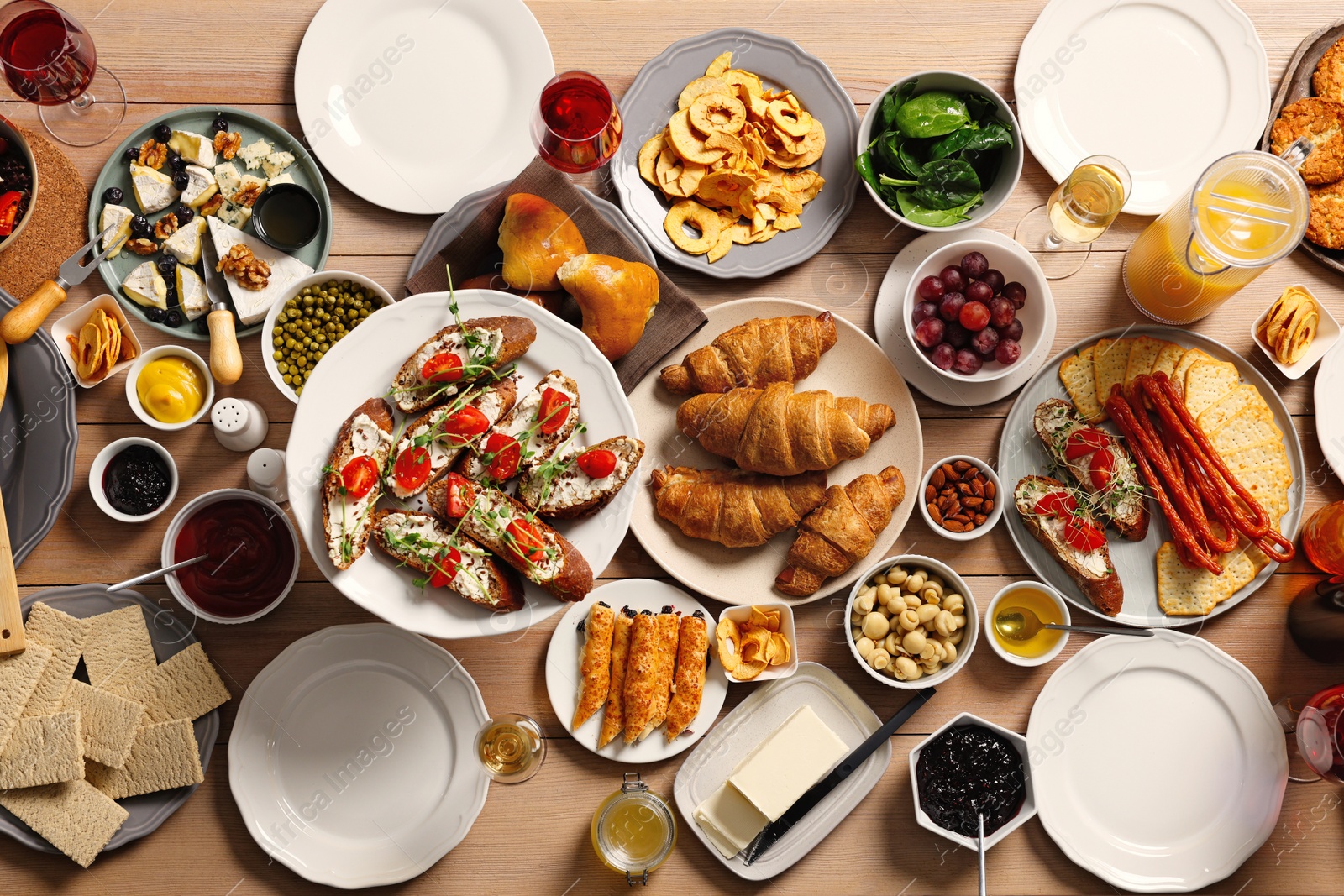 Photo of Brunch table setting with different delicious food, flat lay