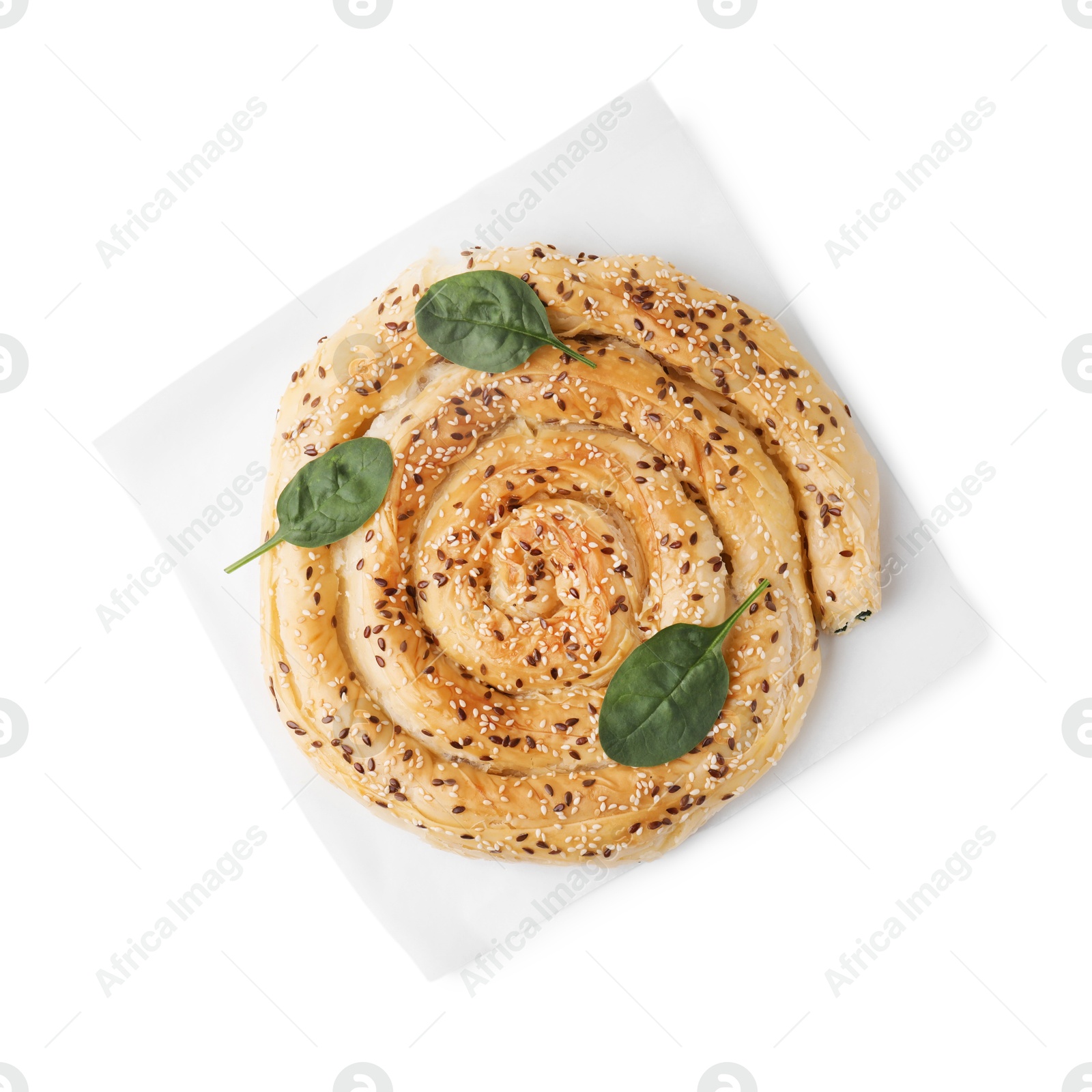 Photo of Delicious puff pastry with spinach isolated on white, top view