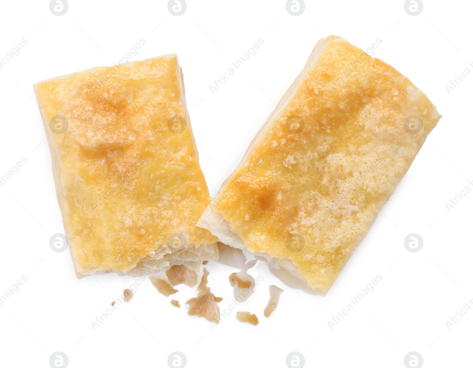 Photo of Delicious fresh puff pastries isolated on white, top view