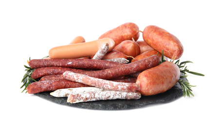 Photo of Slate plate with different tasty sausages isolated on white