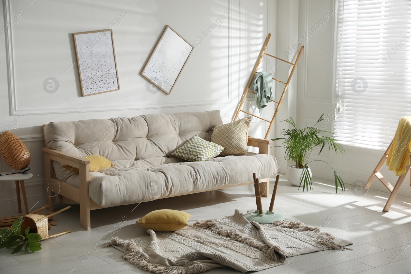 Photo of View on messy living room interior after earthquake