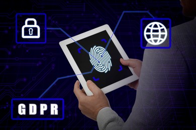 Image of General Data Protection Regulation. Man holding tablet with fingerprint on screen against dark blue background with circuit board pattern, closeup. GDPR abbreviation, icons of padlock and globe linked to device