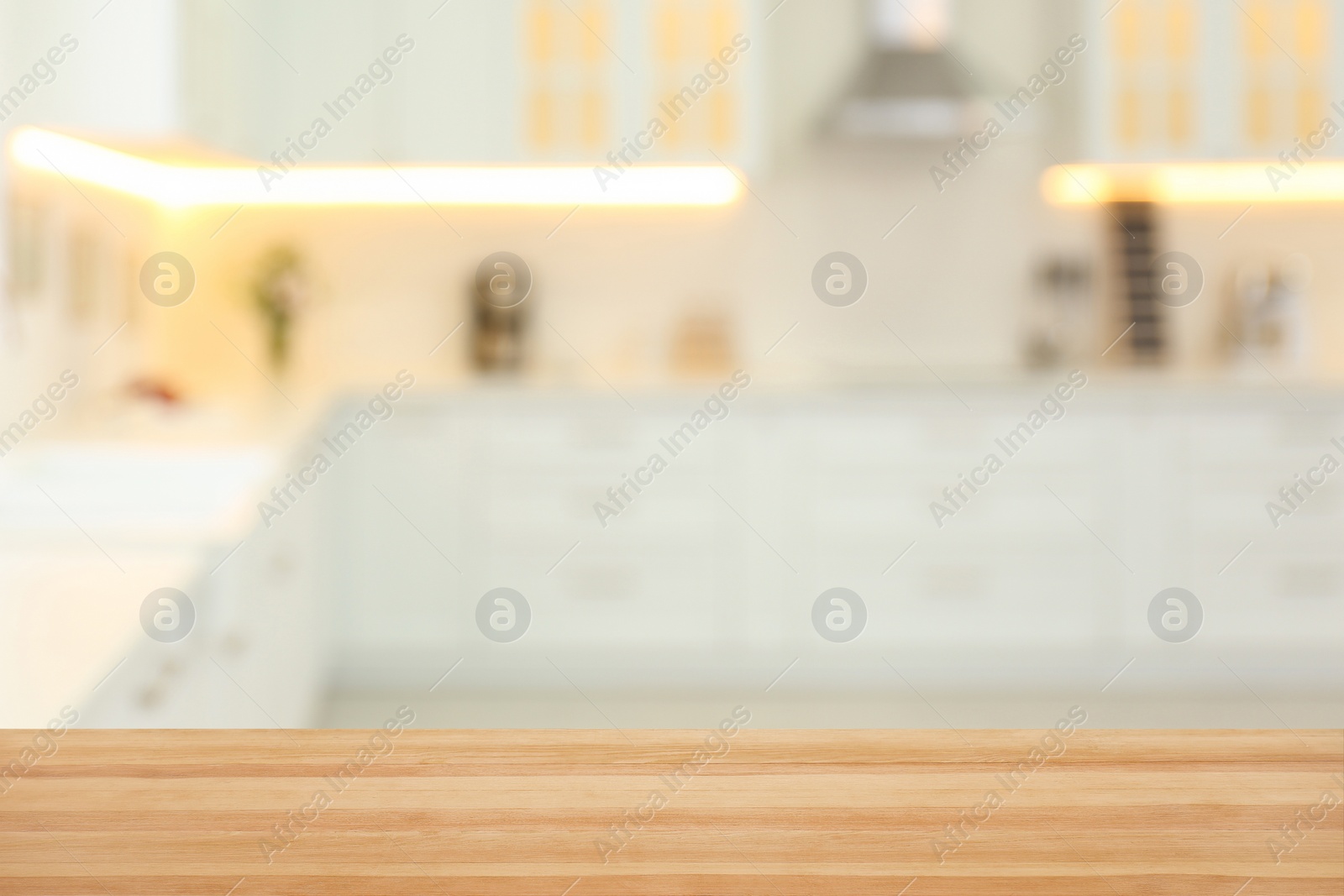 Image of Empty wooden table and blurred view of stylish kitchen interior. Mockup for design