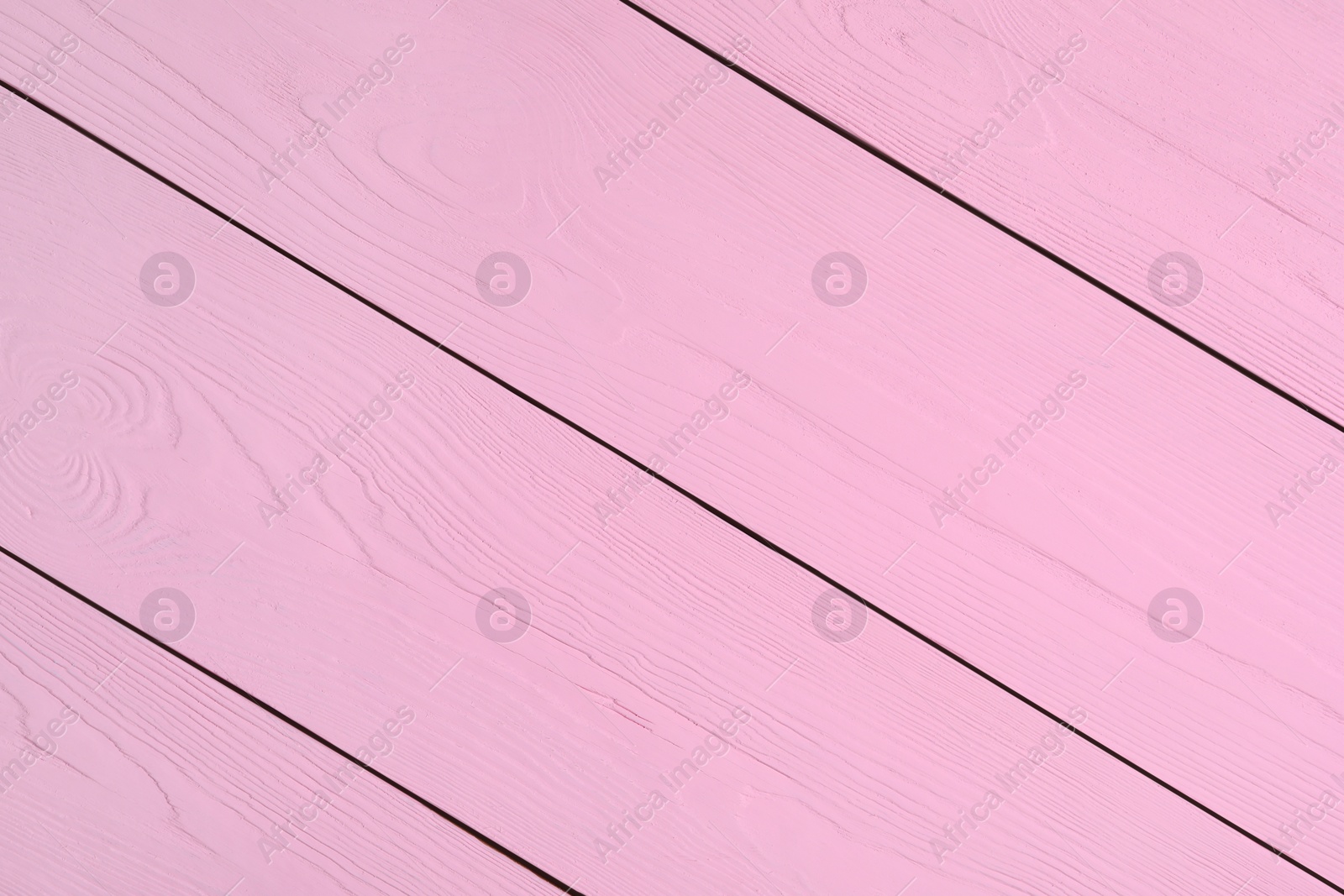 Photo of Texture of pink wooden surface as background, closeup