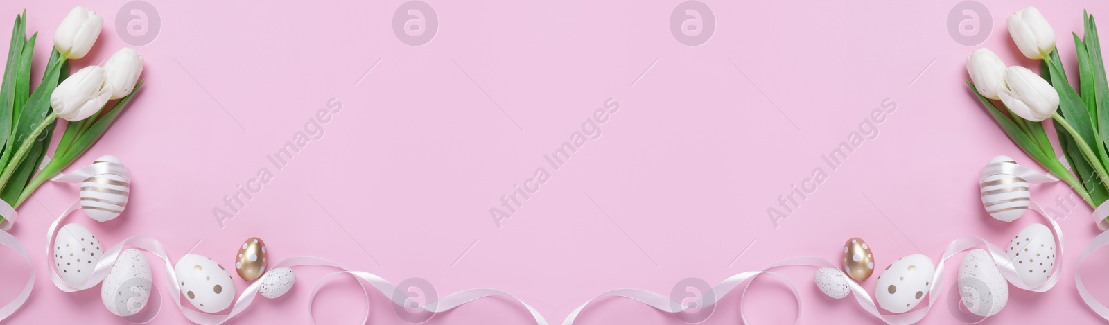 Image of Flat lay composition with decorated Easter eggs and flowers on pink background, space for text. Banner design