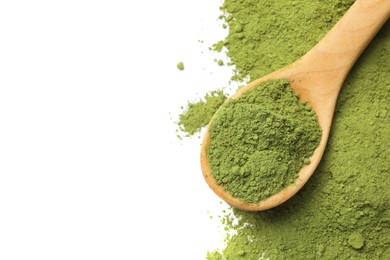 Photo of Green matcha powder and wooden spoon isolated on white, top view