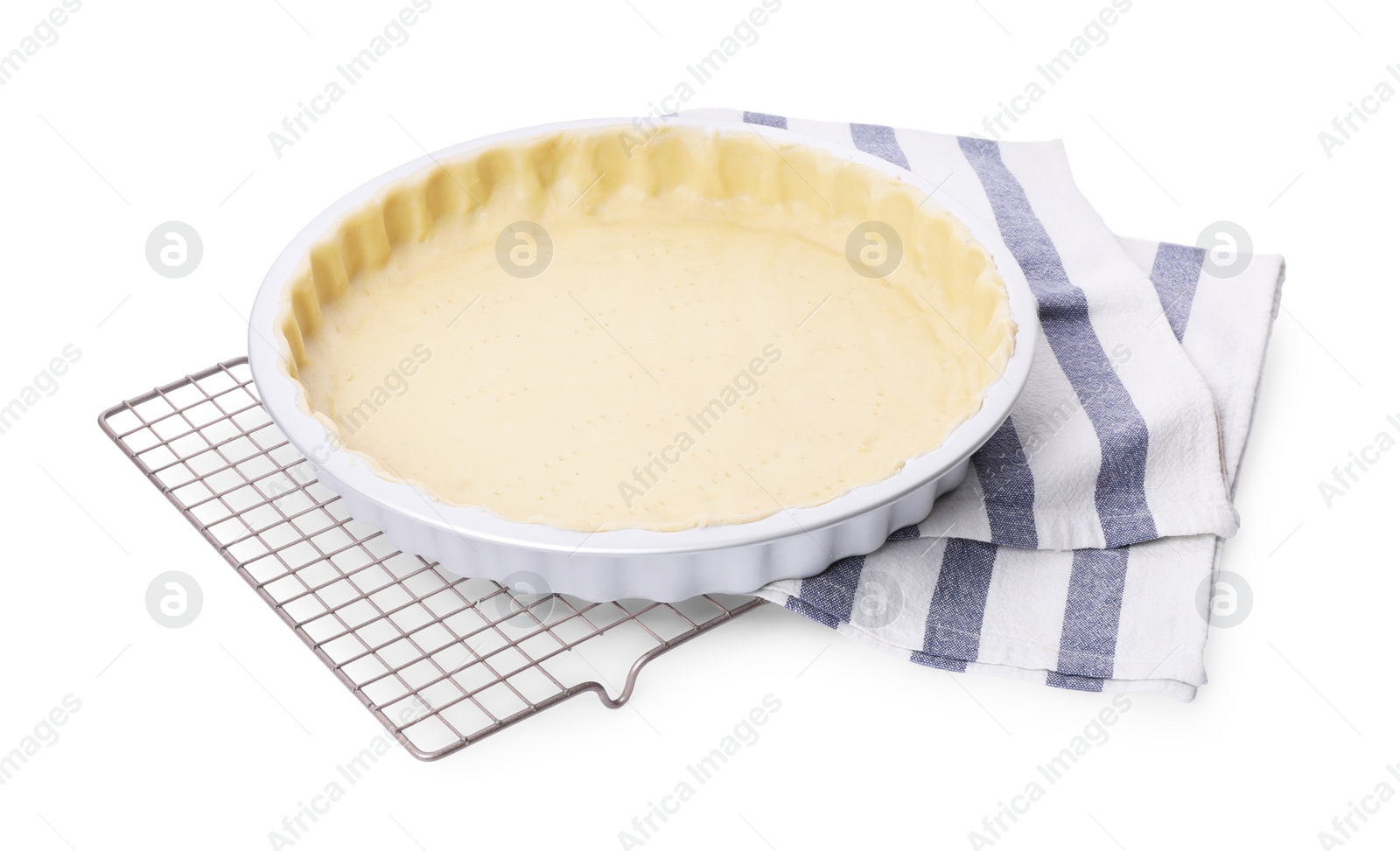 Photo of Making quiche. Tart pan with fresh dough isolated on white