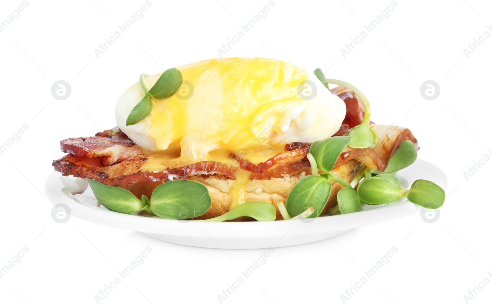 Photo of Tasty egg Benedict with sprouts isolated on white