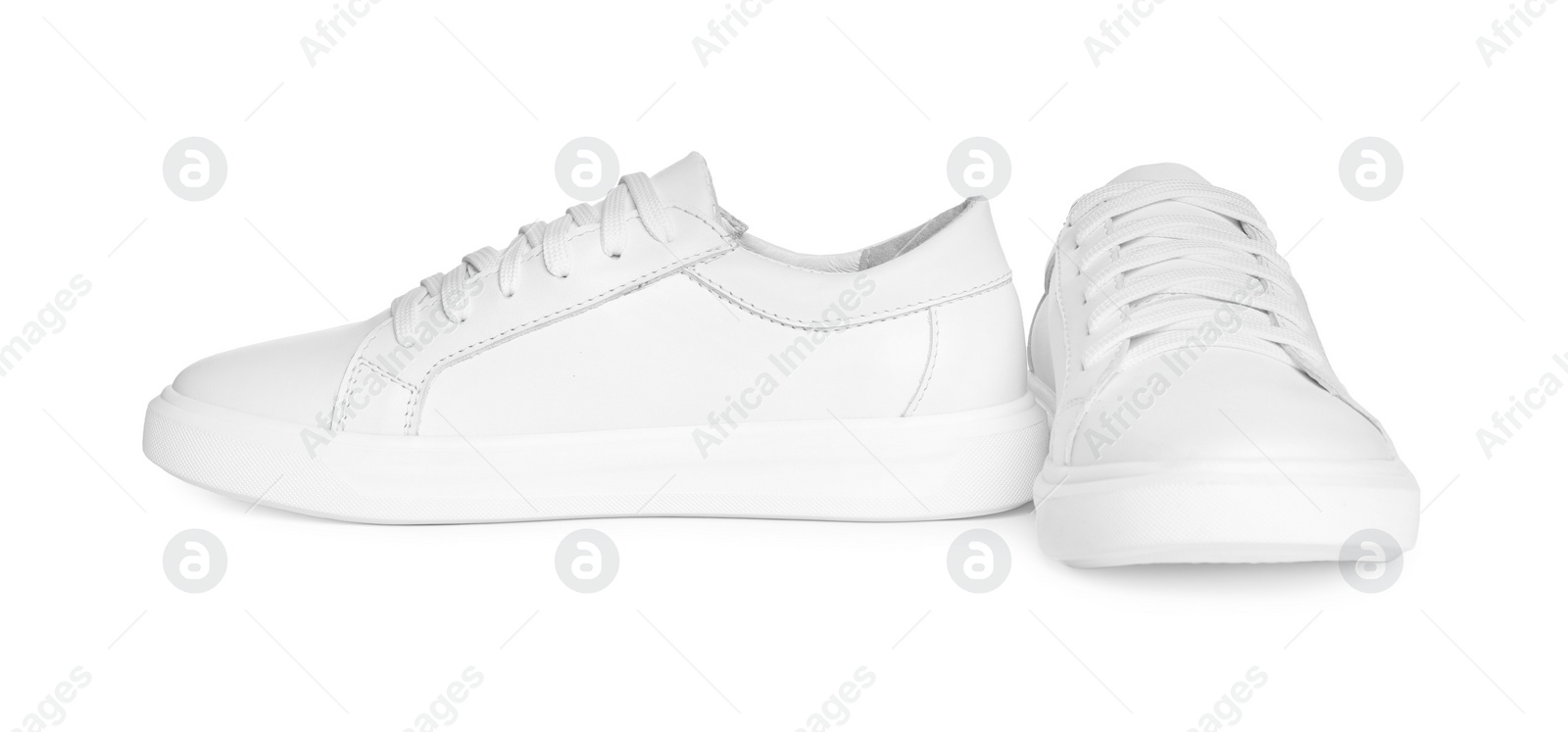 Photo of Pair of stylish sneakers isolated on white