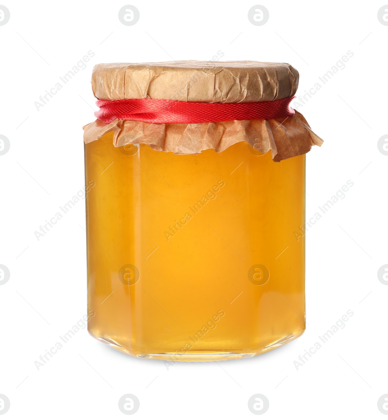 Photo of Tasty honey in glass jar isolated on white