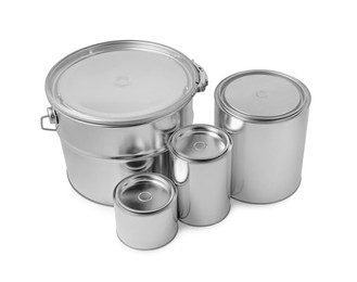 New metal paint cans and bucket on white background