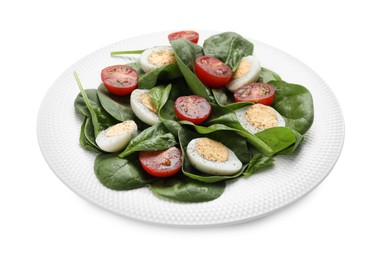 Photo of Delicious salad with boiled eggs, tomatoes and spinach isolated on white