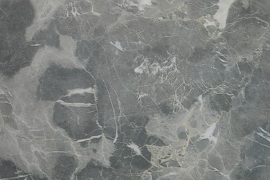 Photo of Texture of grey marble surface as background, closeup