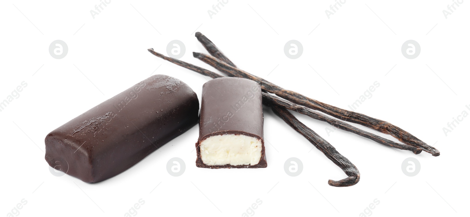 Photo of Glazed curd cheese bars and vanilla pods isolated on white