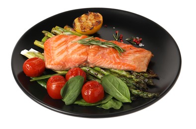 Photo of Tasty grilled salmon with tomatoes, asparagus, spinach and spices isolated on white