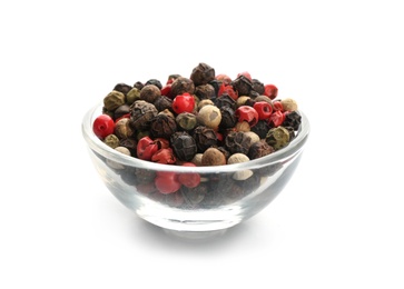 Photo of Glass bowl with different pepper grains on white background