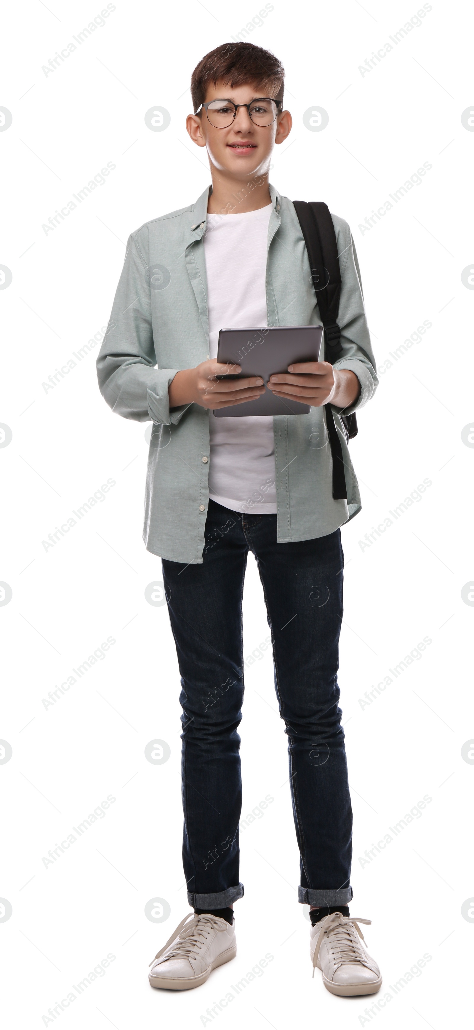 Photo of Teenage student with backpack and tablet on white background