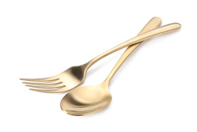 Photo of Shiny golden fork and spoon isolated on white. Luxury cutlery